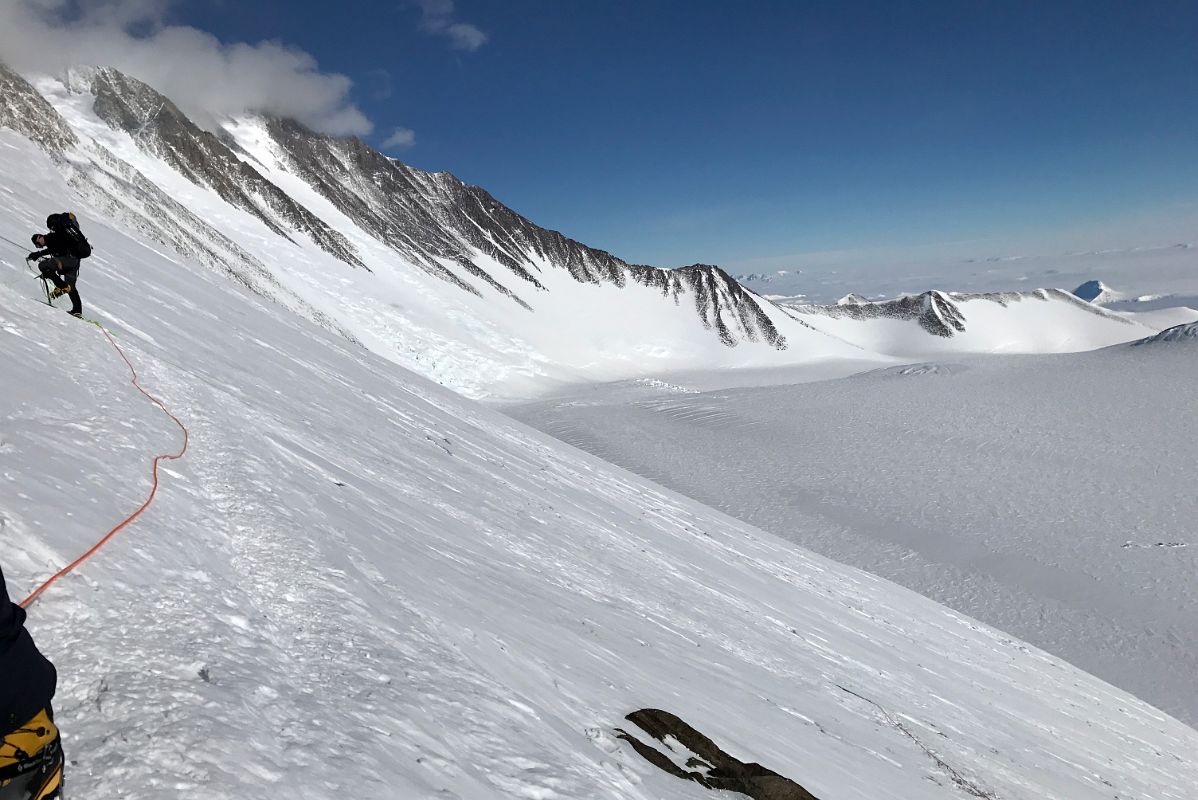 04A Branscomb Peak And Principe de Asturias Peak With Mount Vinson Low Camp Below On Branscomb Glacier From Rest Stop In The Rock Band On The Climb Up The Fixed Ropes To High Camp